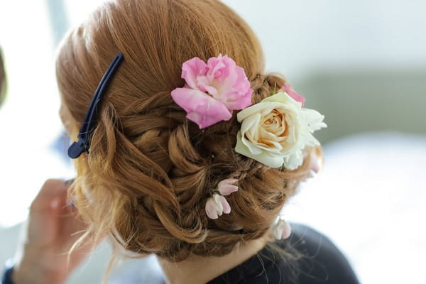 Flowers in bride's hair