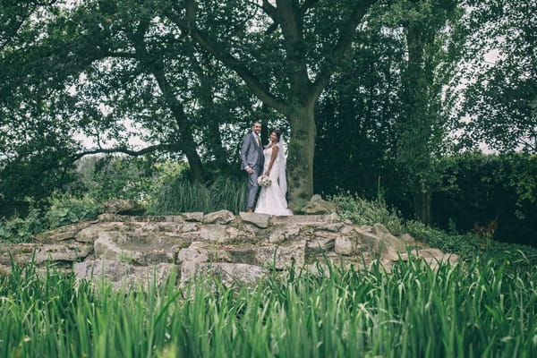 Bride and groom in grounds of Colshaw Hall