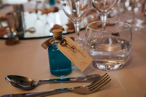 Blue bottle wedding place setting