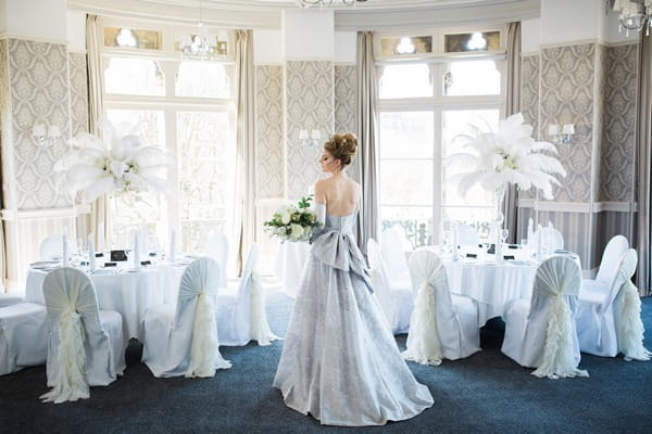 Back of bride's grey wedding dress