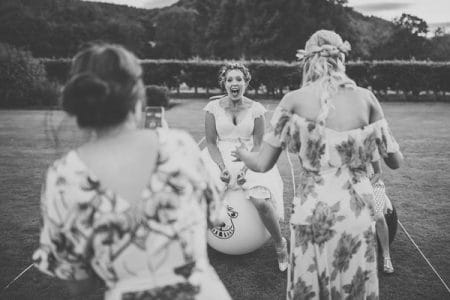 Bride bouncing on space hopper - Picture by Neil Jackson Photographic