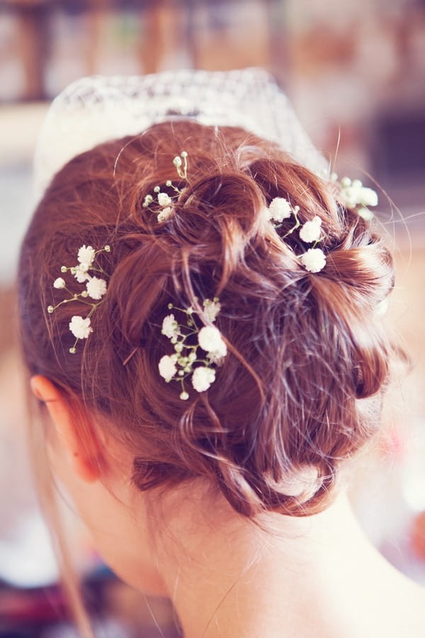 Bridal updo with flowers