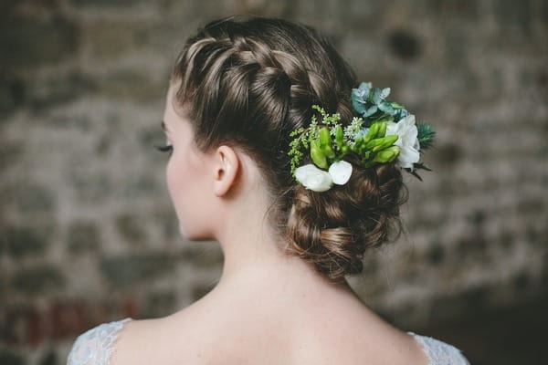 Bride with updo braid hairstyle