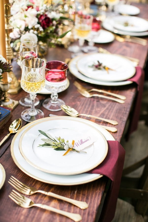 Row of plates on wedding table