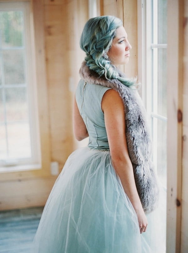 Bride looking out of window