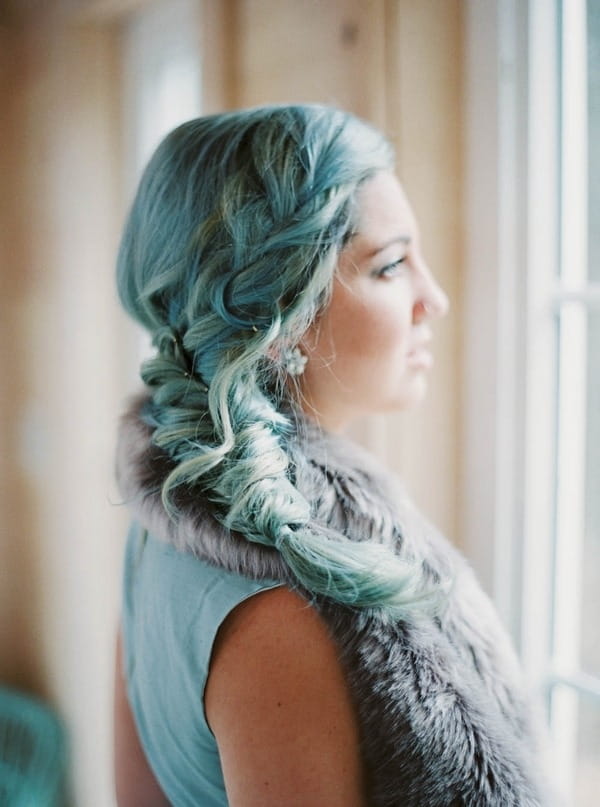 Bride's loose plait hairstyle