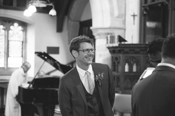 Groom waiting in church for bride