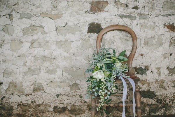 Winter wedding bouquet on chair