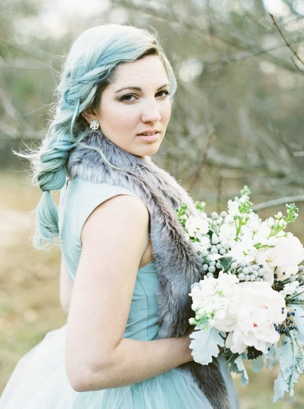 Bride with blue hair looking at camera