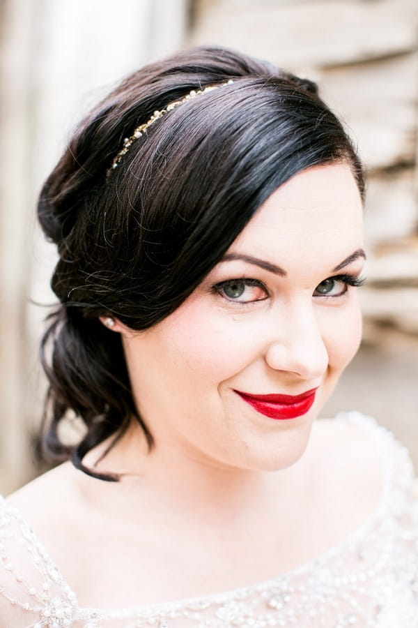 Bride with red lipstick smiling