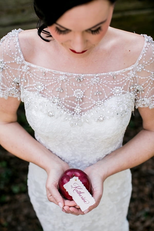 Bride holding apple
