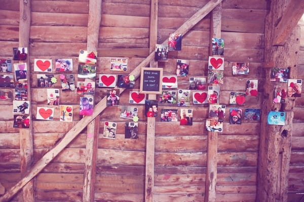 Family photos on barn wall