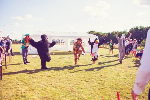 Fancy dress race at West Stoke Farm wedding