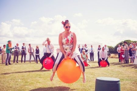 Wedding guest on space hopper