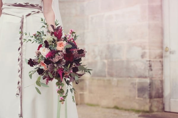 Red and purple winter bridal bouquet