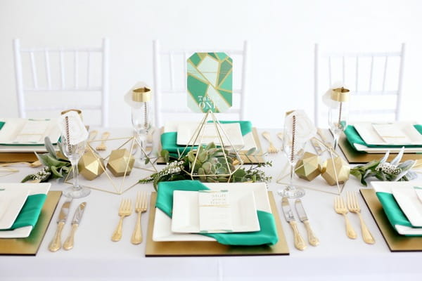 Green and gold geometric wedding table styling