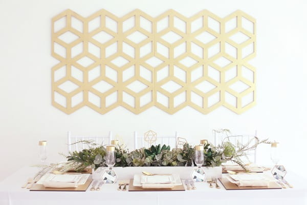 Wedding table with geometric backdrop