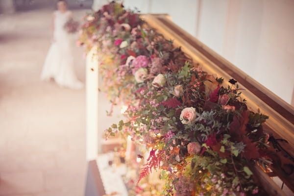 Floral styling above wedding table