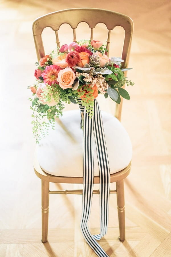 Bright wedding bouquet on chair