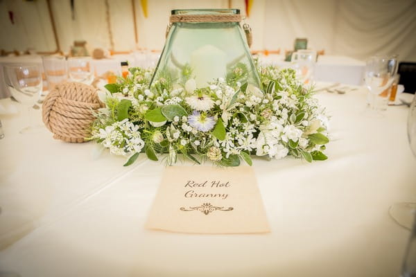 Vase and floral wedding table centrepiece