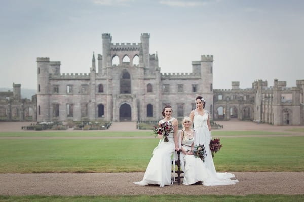 Brides in front of Lowther Castle