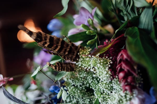 Floral display with feathers