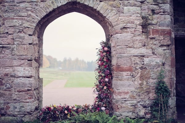 Floral display in arch