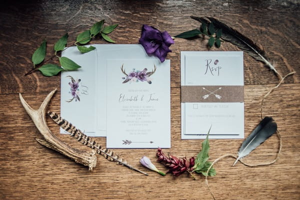 Feather and foraging themed wedding stationery