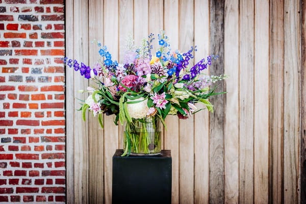 Vase of colourful flowers