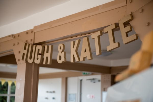 Hanging wooden name sign
