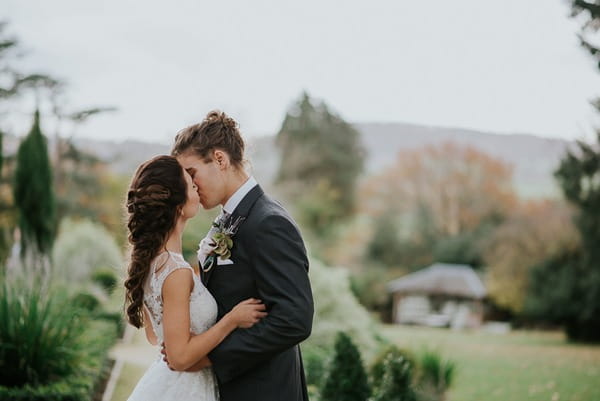 Bride and groom kissing