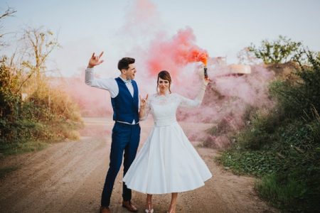 Bride and groom with coloured flare - Picture by Benjamin Stuart Photography