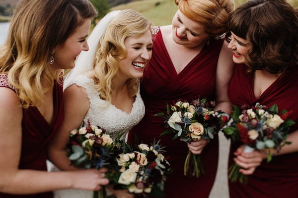 Bride laughing with bridesmaids - Picture by Jess Petrie Photography