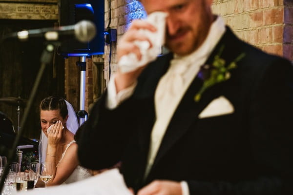 Bride and groom bold crying during groom speech - Picture by York Place Studios