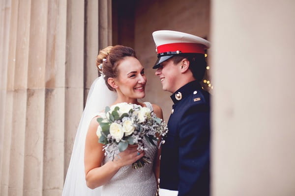 Bride and military groom smiling - Picture by Honeydew Moments