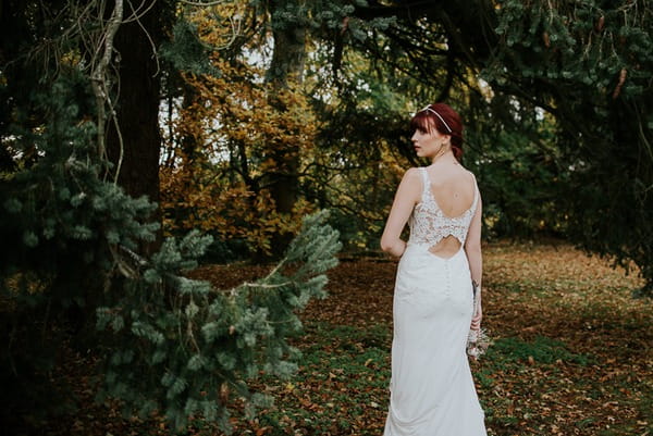 Bride wearing open back wedding dress