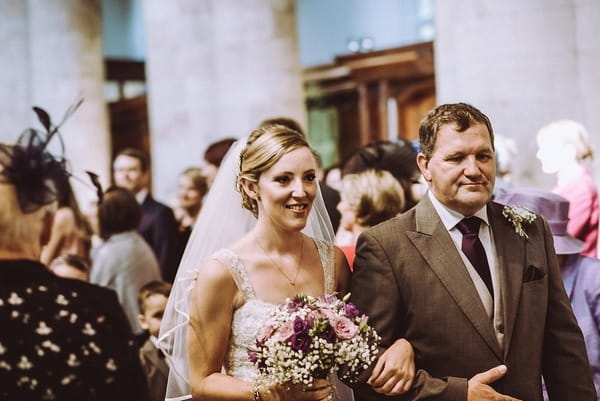 Father walking bride down the aisle