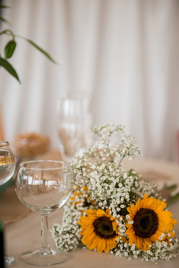 Sunflower and gypsophila bouquet on table