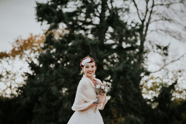 Bride wearing winter shrug