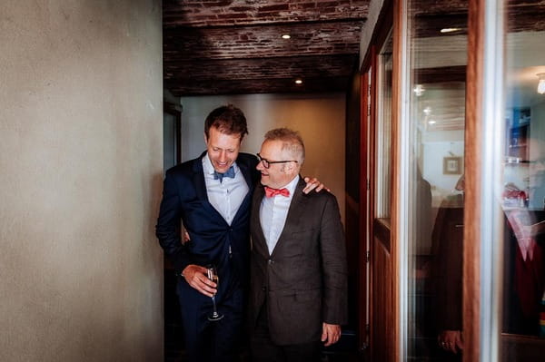 Groom welcoming wedding guest