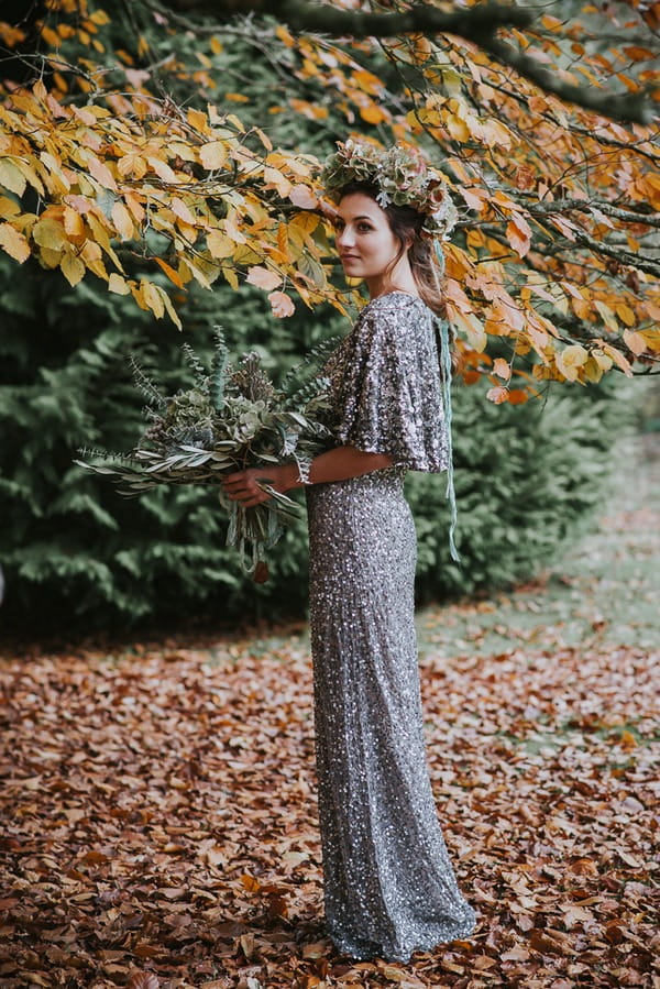 Bride wearing silver sequin wedding dress