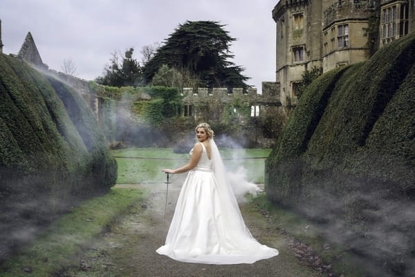 Bride with sword in grounds of Thornbury Castle