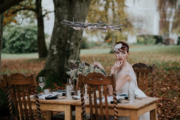 Bride sitting at table