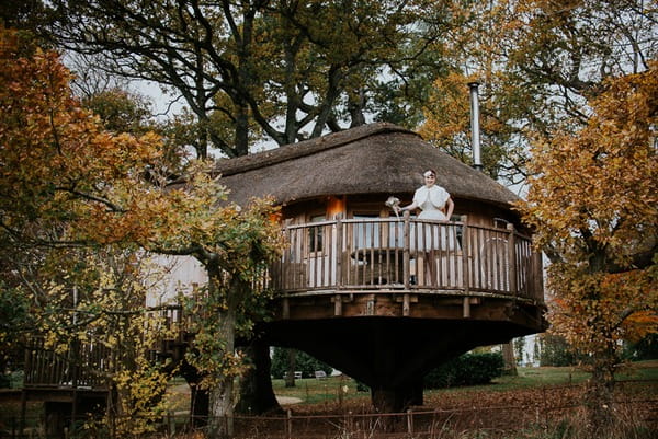 Bride on balcony of Deer Park tree house