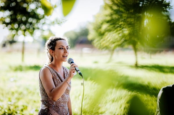 Woman speaking at wedding