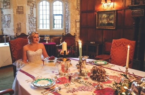 Bride sitting at table