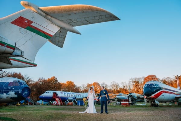 Bride and groom in airfield - Picture by Emma-Jane Photography
