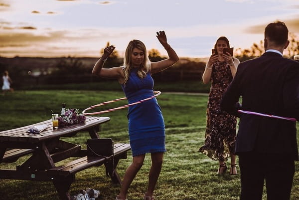 Wedding guest hula hooping