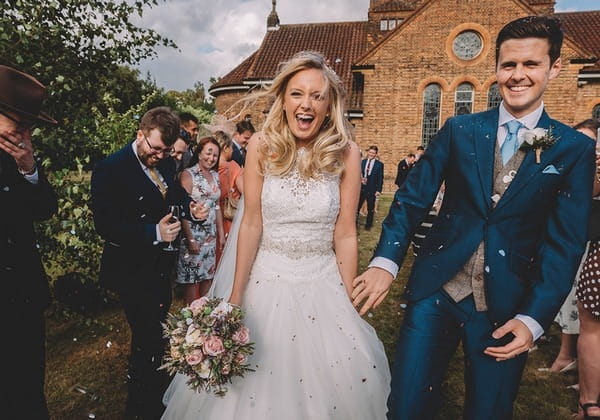 Bride and groom confetti shot - Picture by Emma-Jane Photography