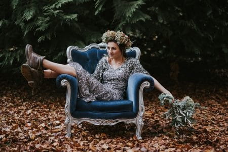 Bride in boots sitting on chair